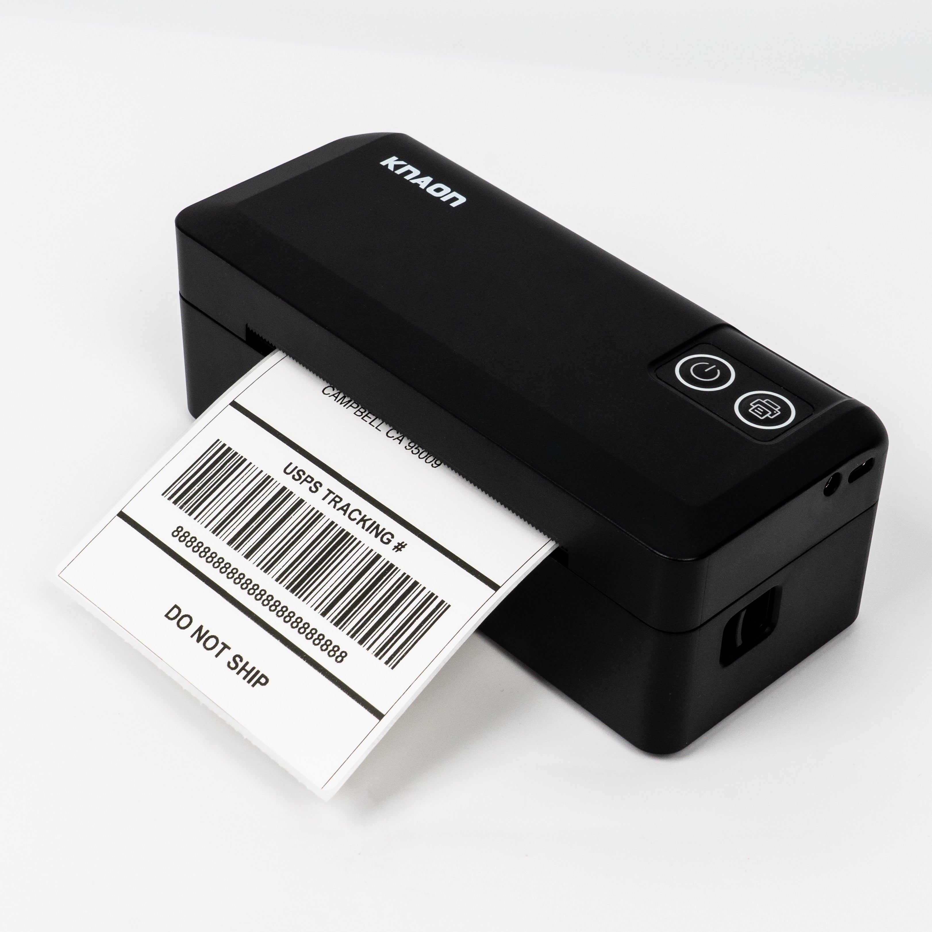 KNAON Y41BT Black Bluetooth thermal shipping label printer printing a shipping label